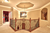 Entry Vestibule from second floor landing, Media Room on left.