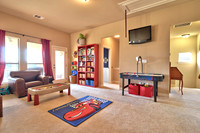 Game Room with rear second staircase.