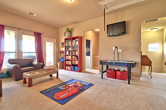 Game Room with rear second staircase.